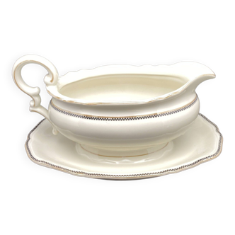 Porcelain sauce boat with black and gold checkered border