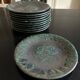 11 flat ceramic plates from Petit Massé Morvan.