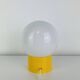 Space Age ball lamp, opaline with a yellow base, 1960s.