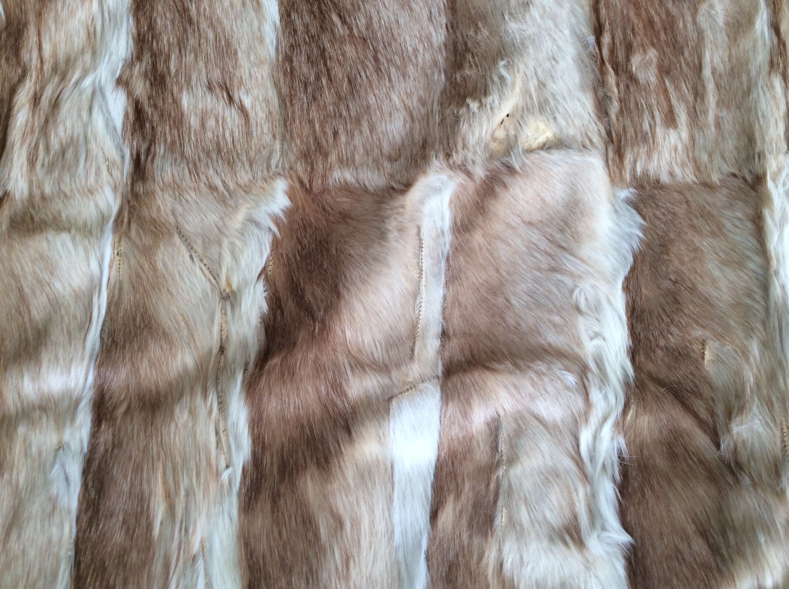 Rabbit skin rug, 200x225cm.