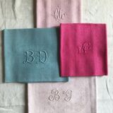 Suite of four antique tinted napkins