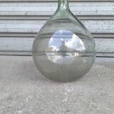 Green demijohn in blown glass