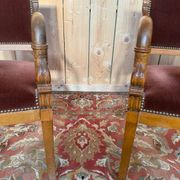Paire de fauteuils style Empire – Accoudoirs dauphins – Hêtre et velours