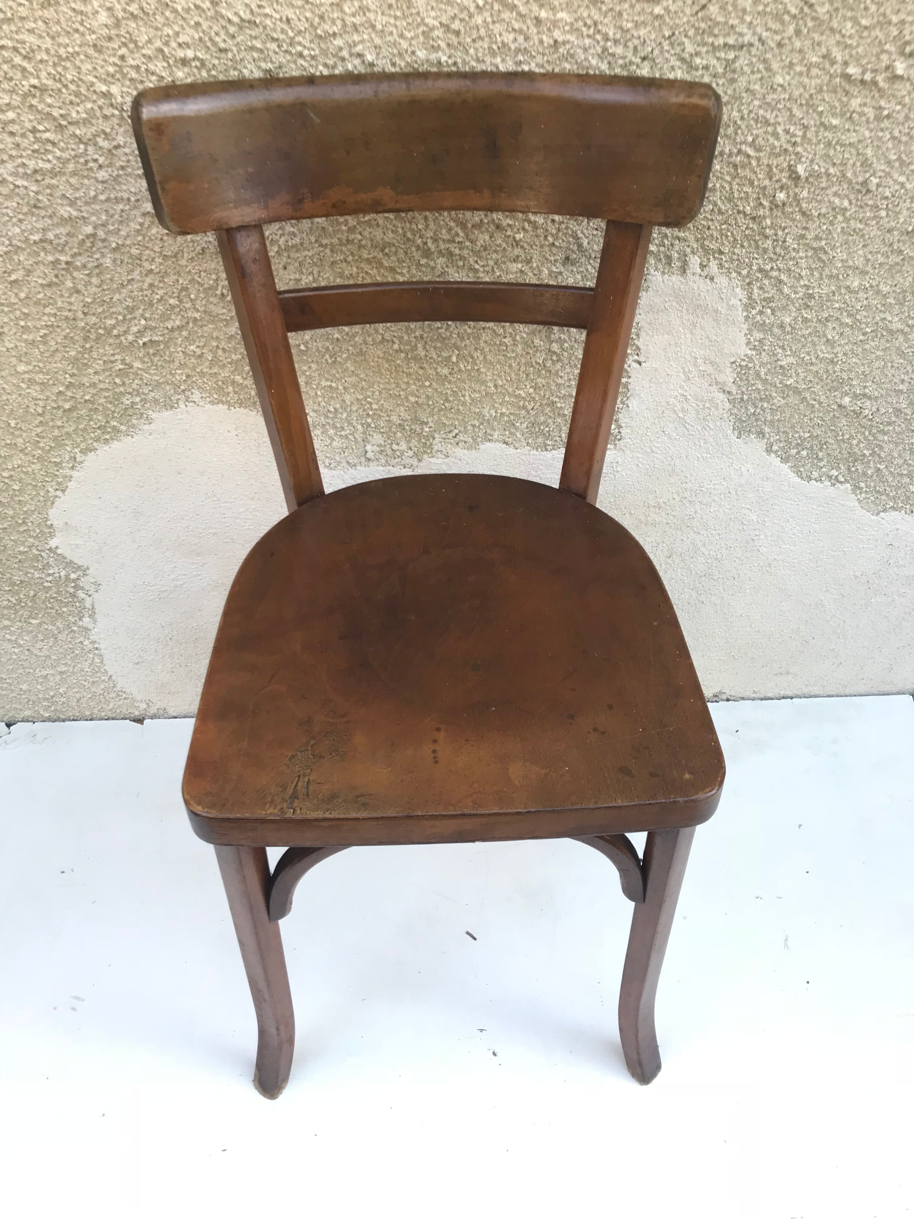 Serie de 4 chaises anciennes bistrot Baumann années 60
