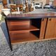 Vintage sideboard with sliding doors from the 60s
