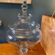 Glass jar on pedestal