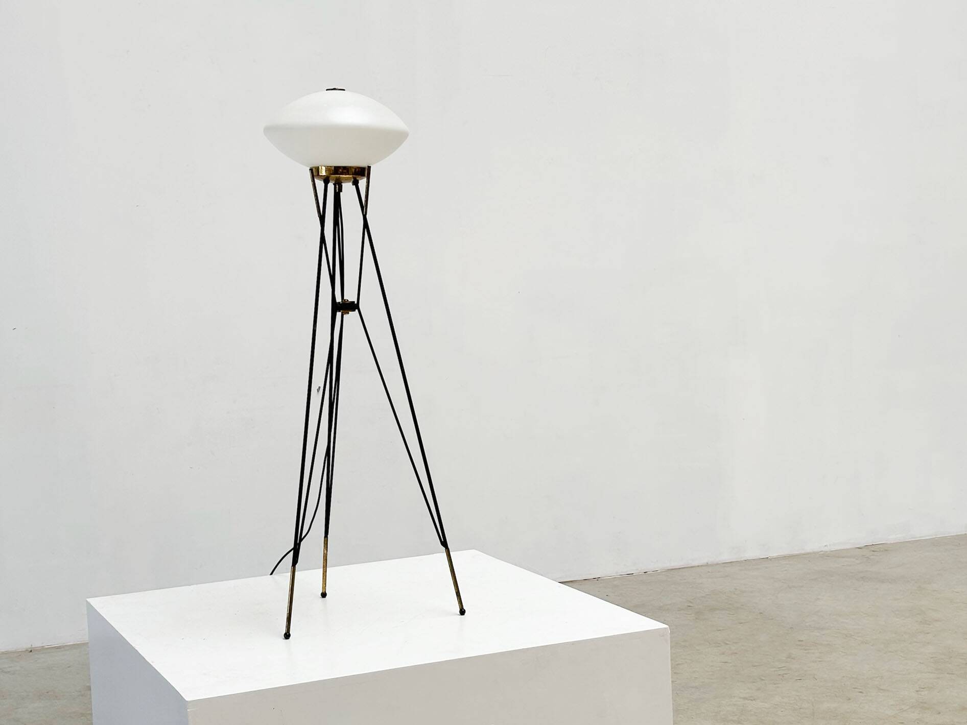 Elegant Italian floor lamp with a white opaline shade.