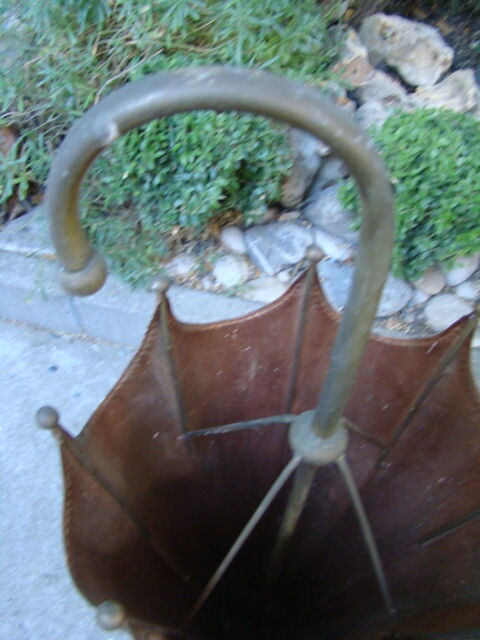 Old copper umbrella holder