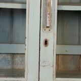 Art Deco glass cabinet in Burmese teak with original turquoise patina