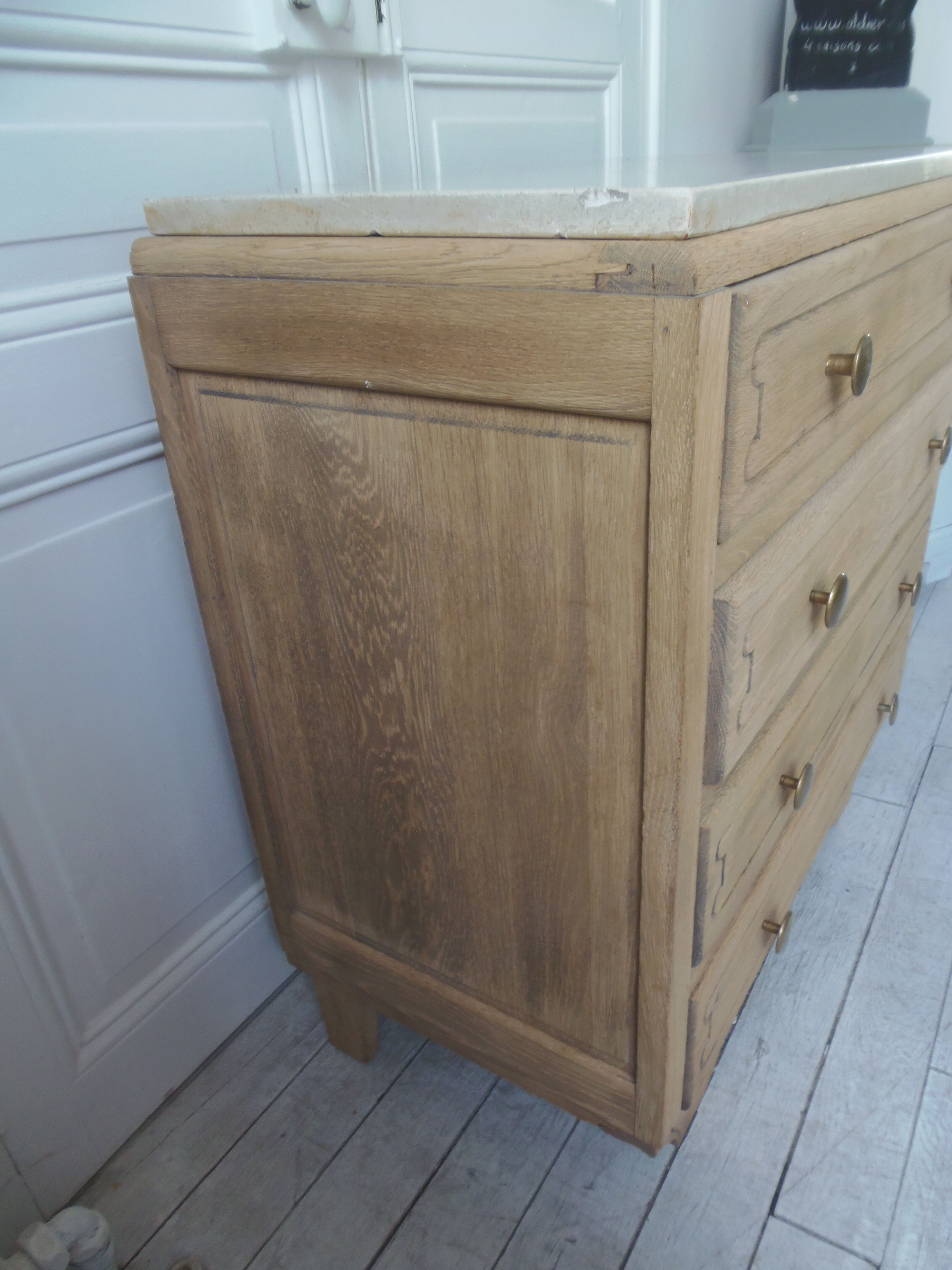 Vintage oak chest of drawers, a travertine plate laid for tray.