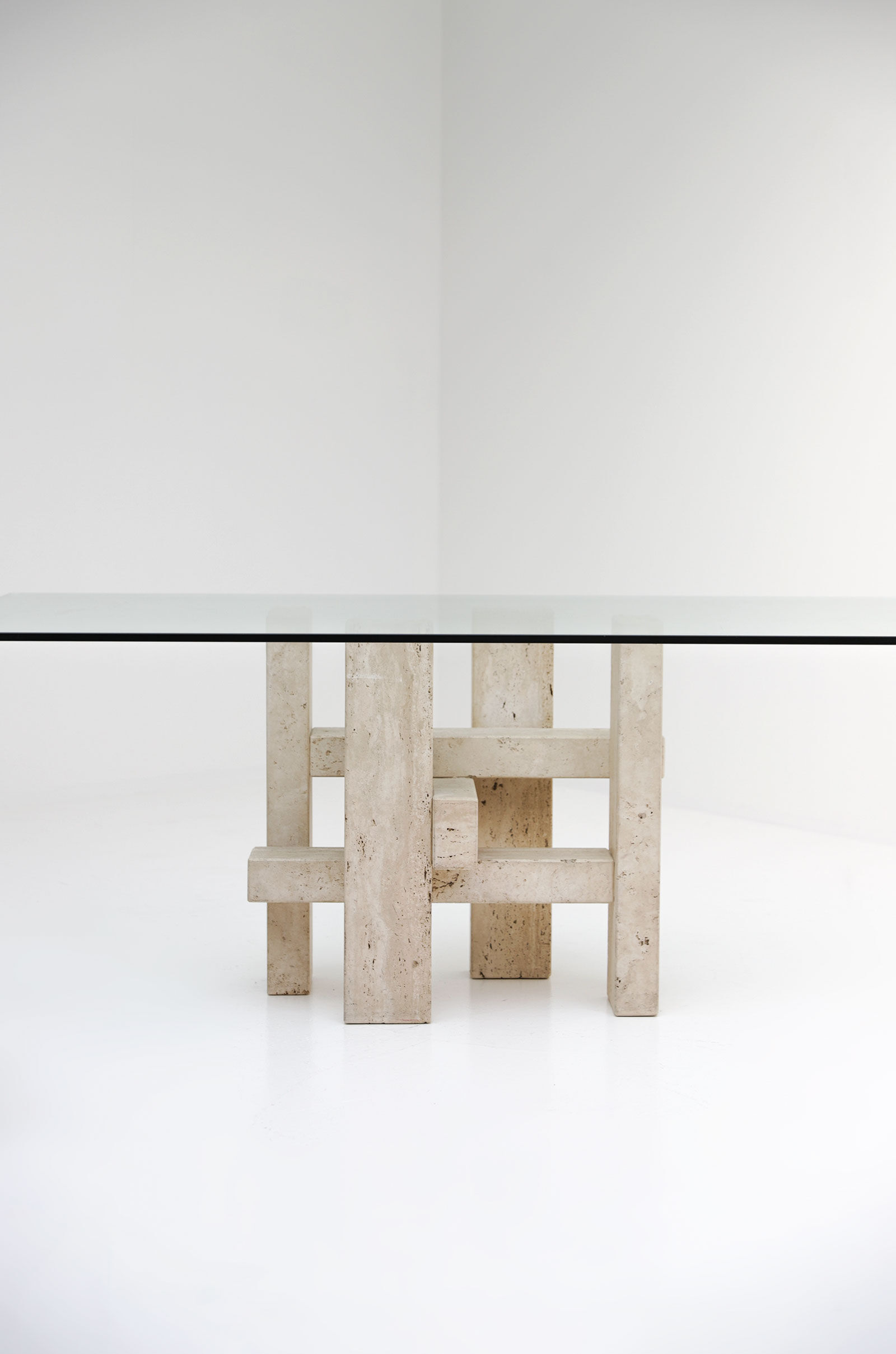 Travertine dining table by Willy Ballez
