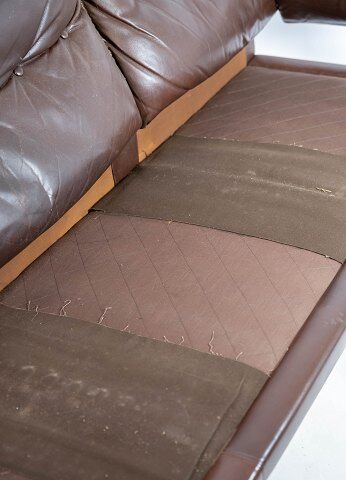 Three seater sofa upholstered with patinated brown leather by Arne Norell, 1970s