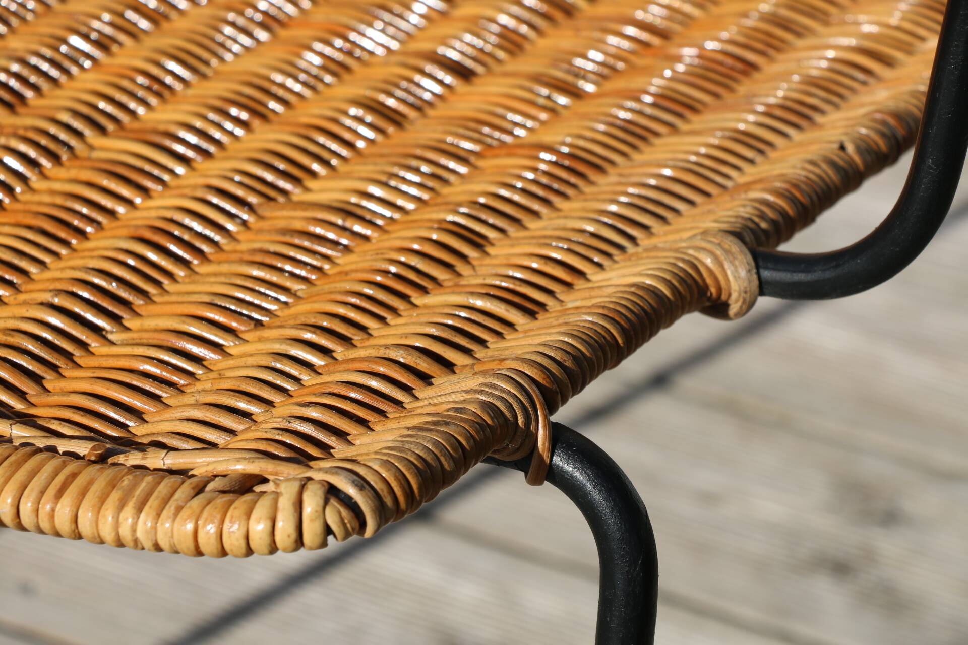 Rattan and steel armchair