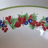Large ceramic fruit bowl with red fruits