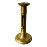 Antique brass candlestick with push button, candlestick.