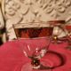 1930s footed glass service with gilding, including champagne flutes.