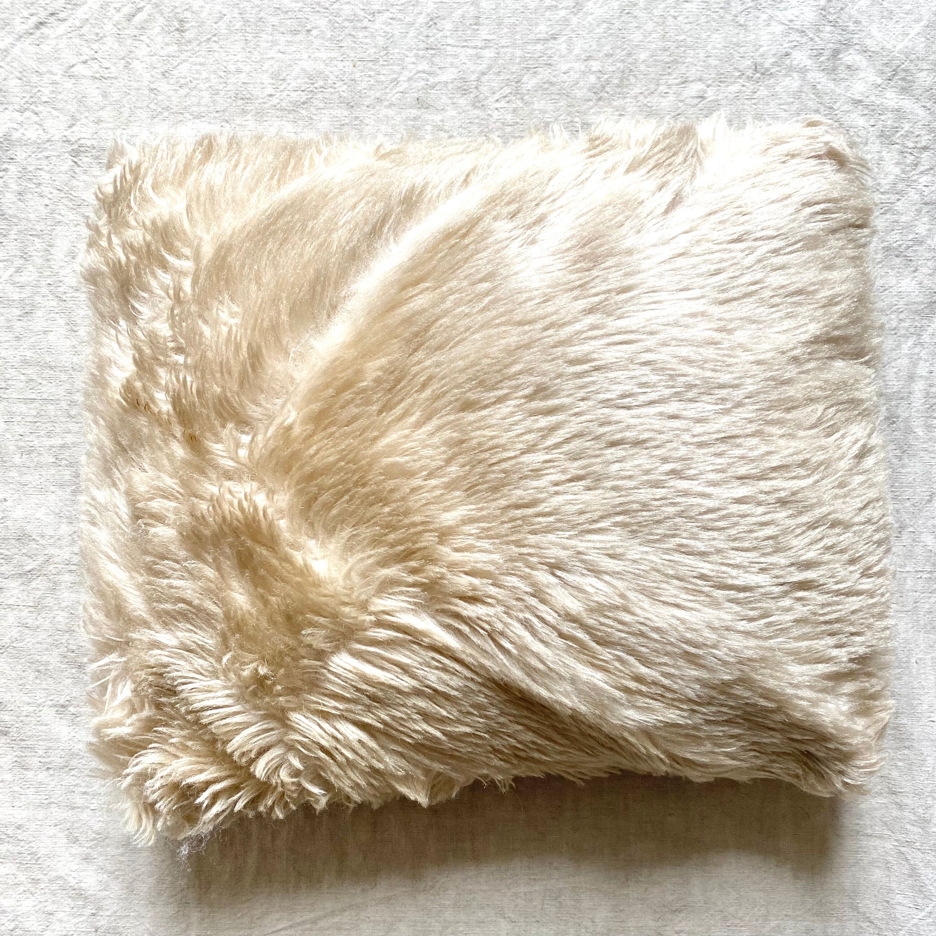 Coussin fourrure vintage années 70