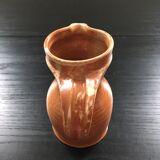 Signed pitcher in yellow ochre sandstone
