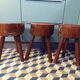 Trio of brutalist tripod stools