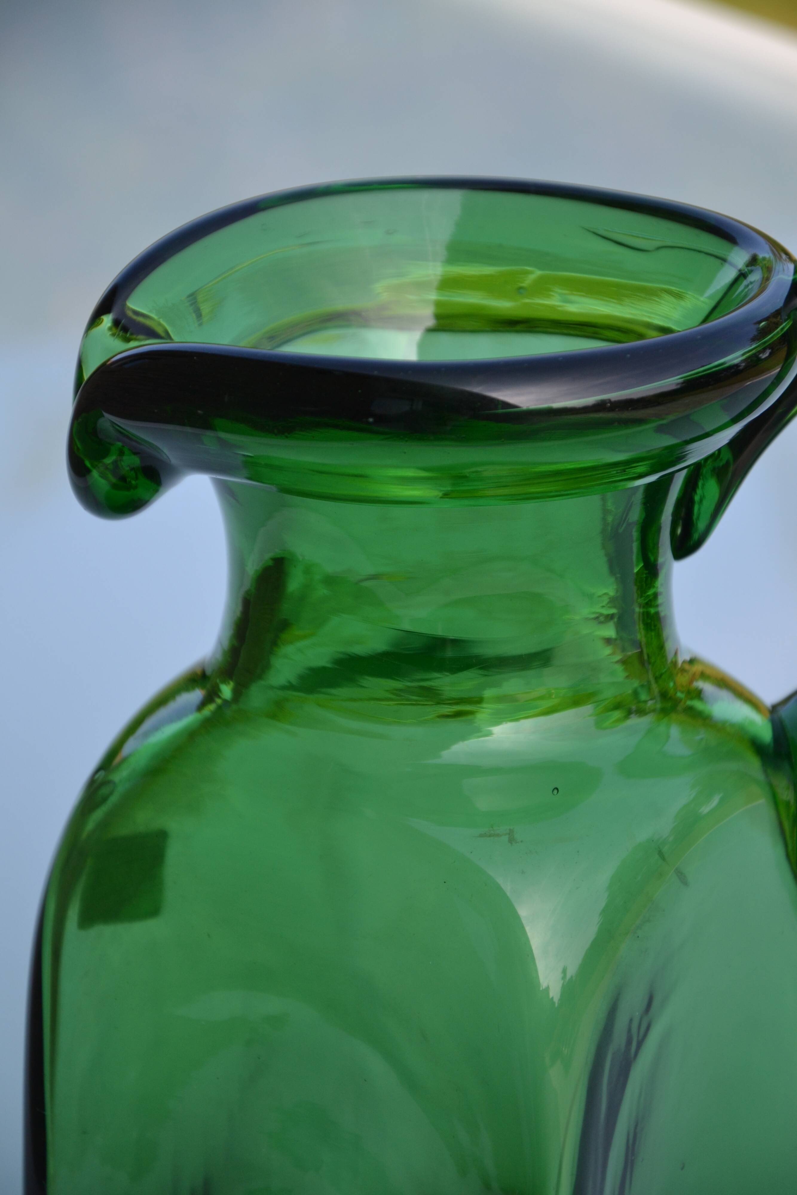 Handcrafted green glass pitcher from Spain