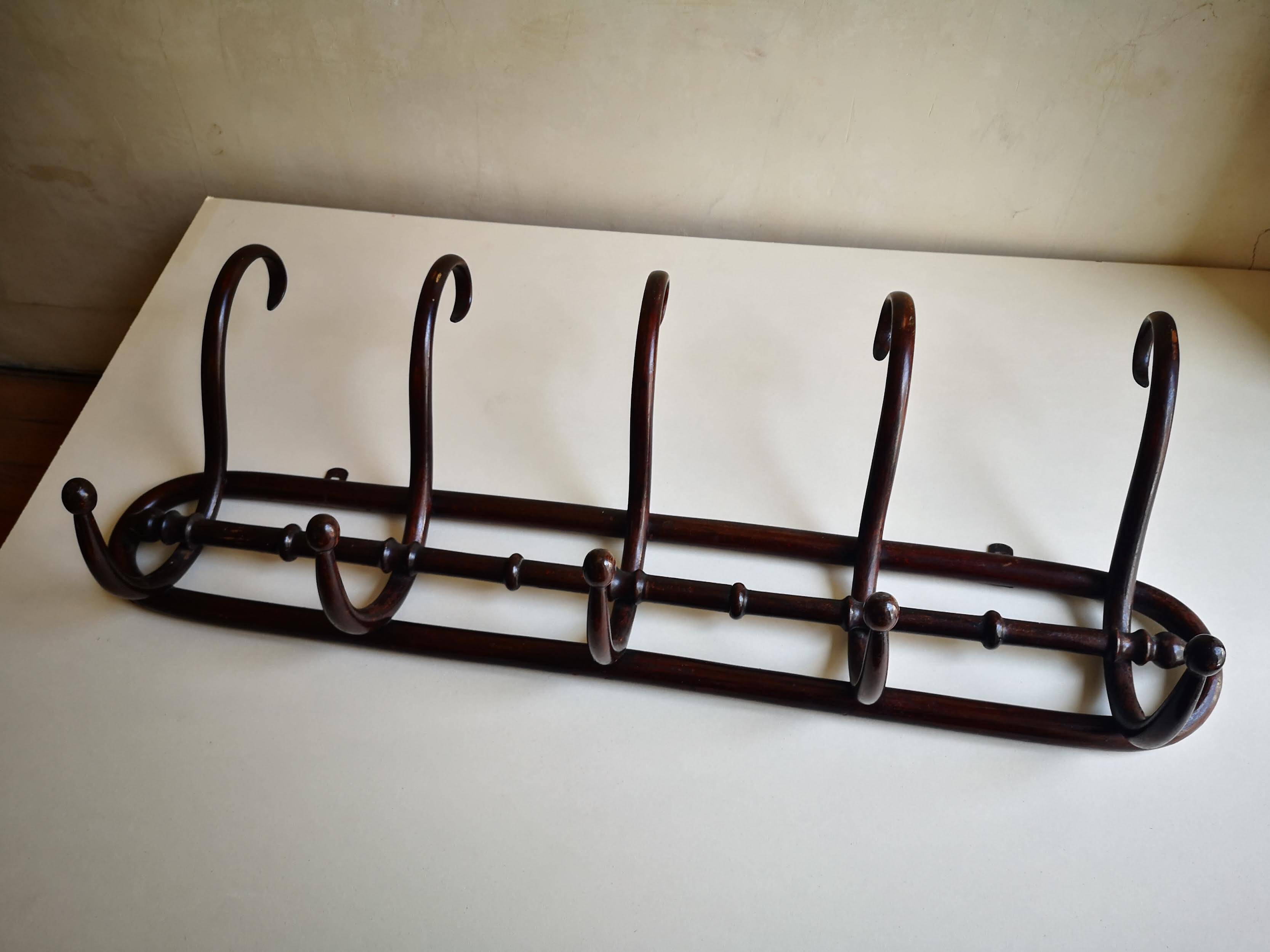 Vintage wooden wall coat rack