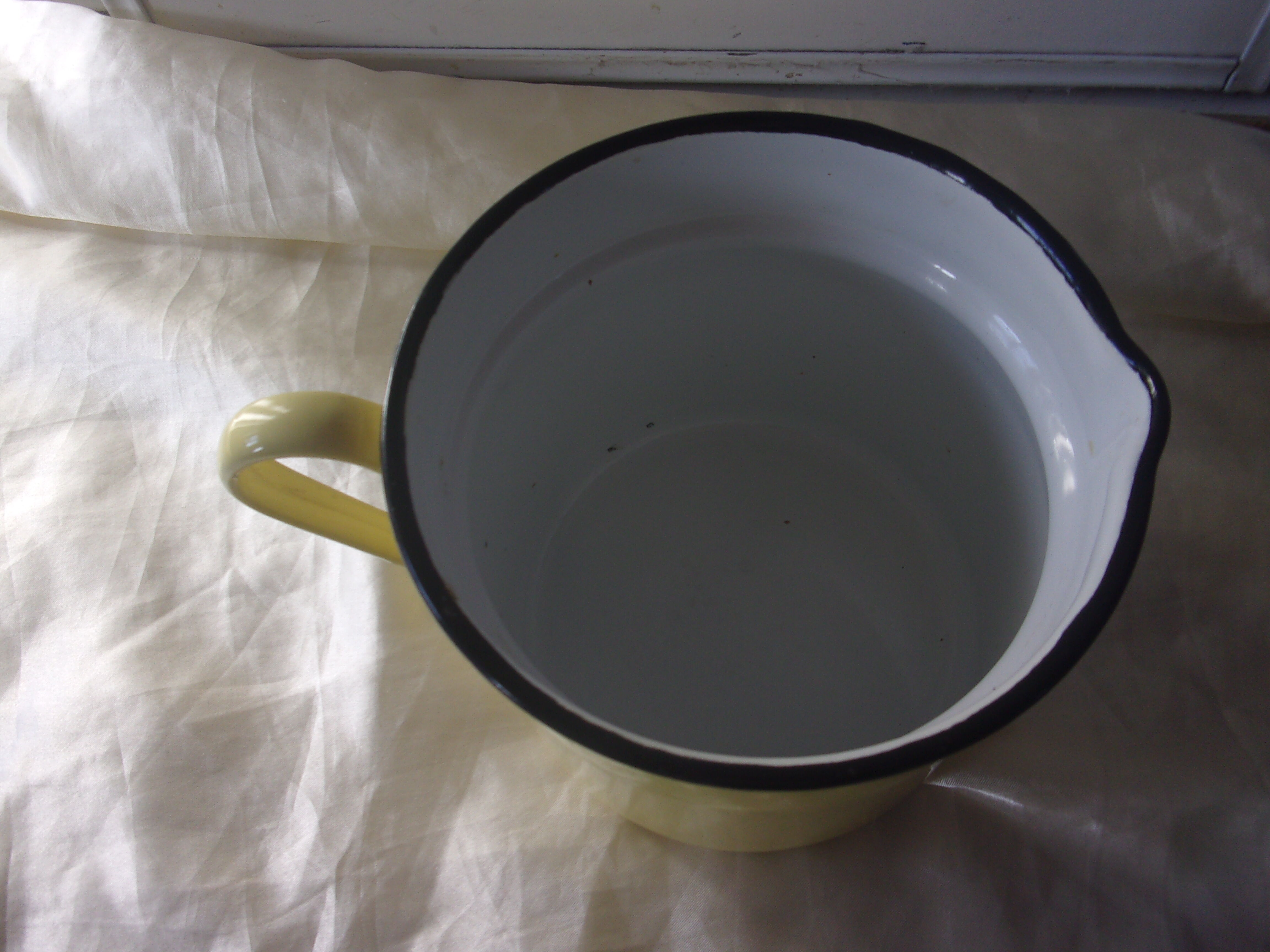 Enamelled water or milk jar