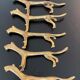 6 lioness-shaped brass knife holders