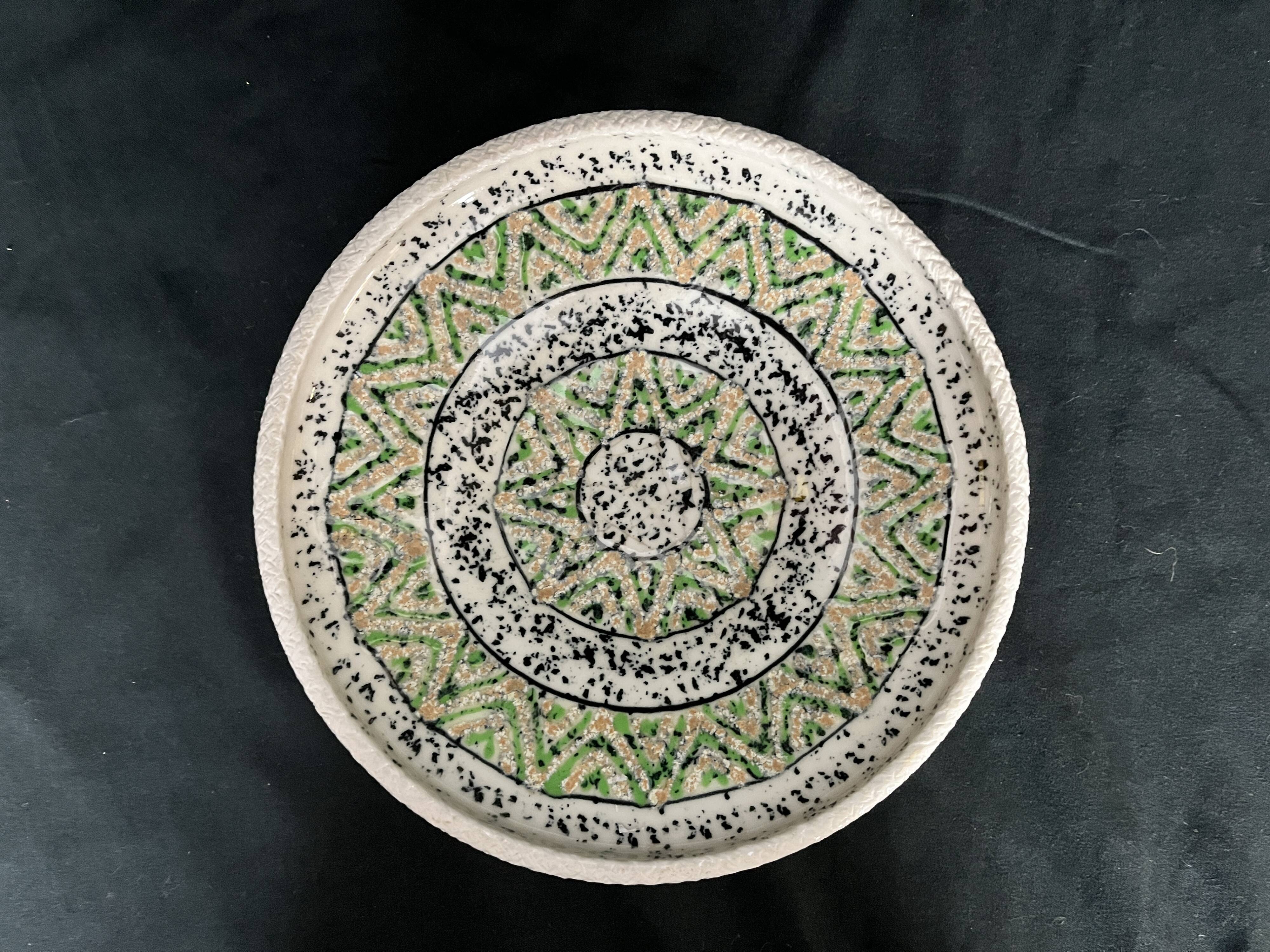 Art Deco polychrome ceramic cup with geometric patterns, 20th century