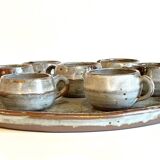 Enamelled stoneware tray and its 7 cups