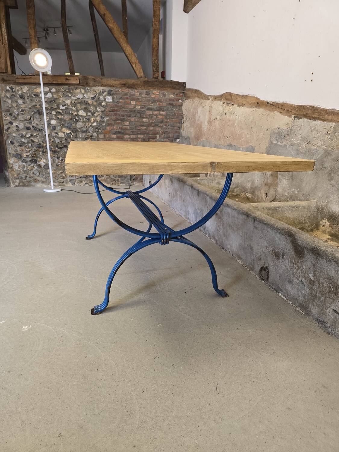 Wrought iron and solid wood table