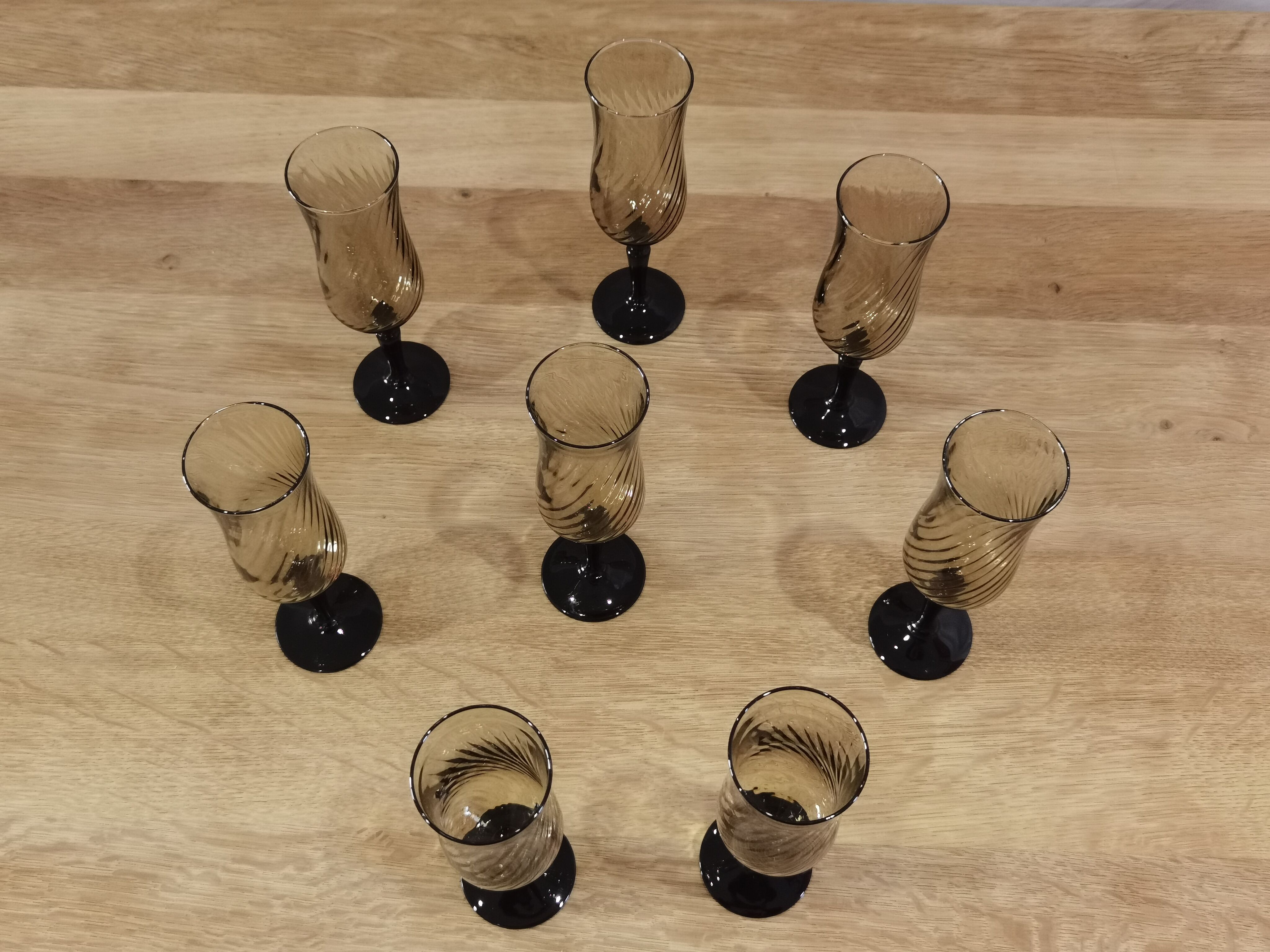 8 vintage smoked champagne flutes with black feet Arcoroc