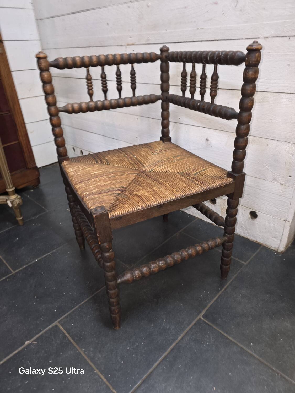 Antique corner fireplace armchair