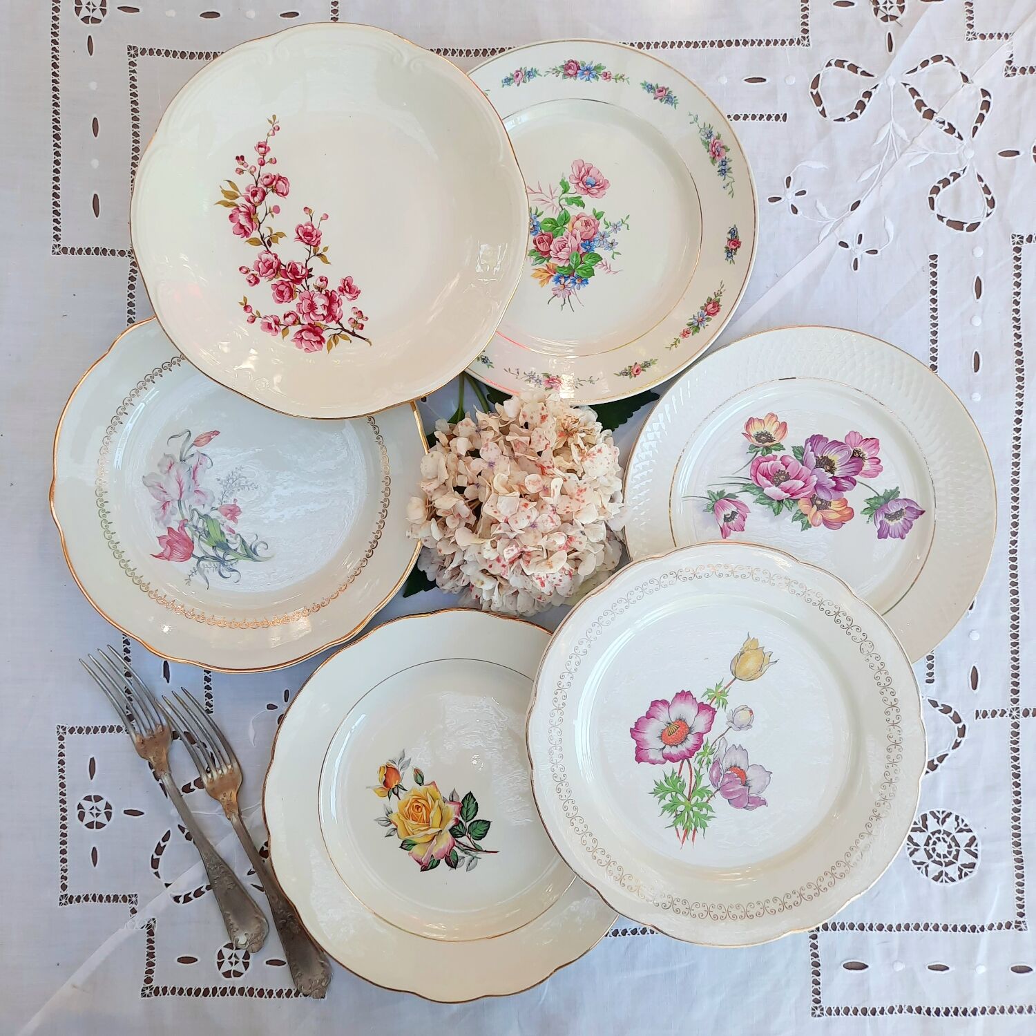 Old flat plates mismatched in earthenware