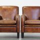 Set of 2 characterful, comfortable armchairs made of sheepskin leather with a sleek Art Deco design