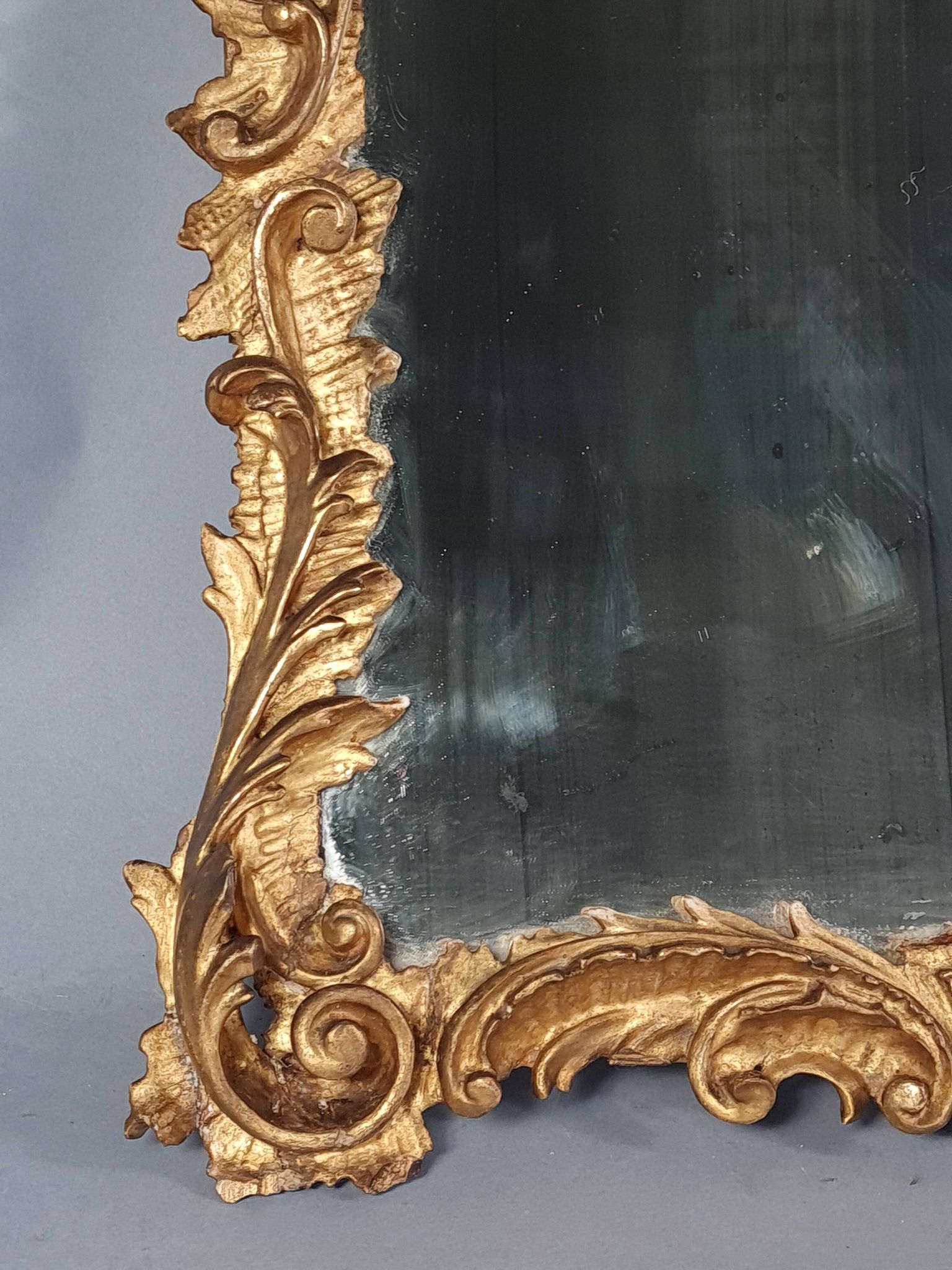 Mirror circa 1800, carved and gilded wooden frame, rocaille decoration, 54x39 cm, C227