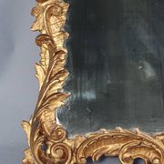 Mirror circa 1800, carved and gilded wooden frame, rocaille decoration, 54x39 cm, C227