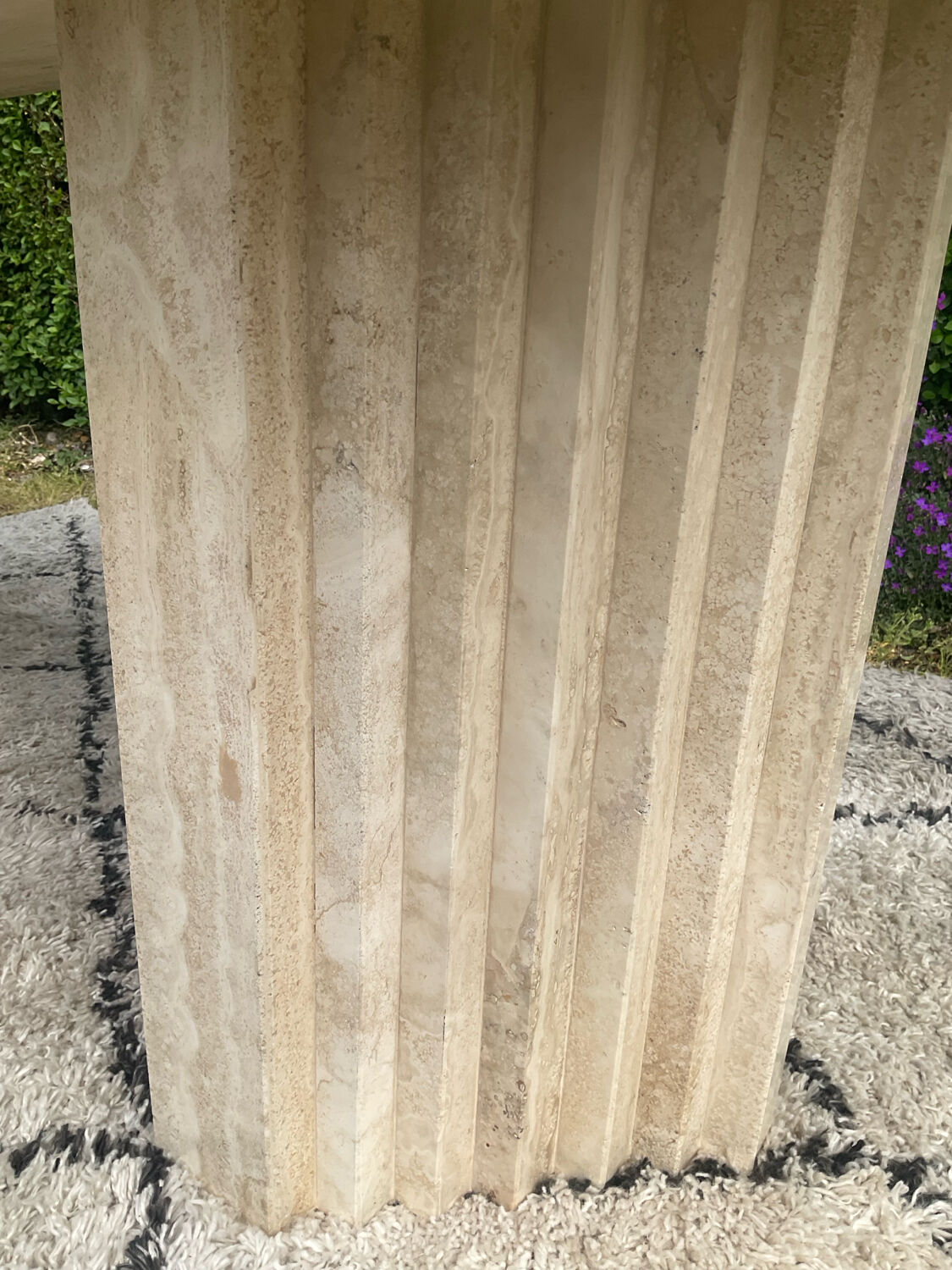 Large vintage dining table in travertine in the 1970s Carpa style.