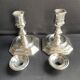 Pair of candlesticks in silver metal regency style