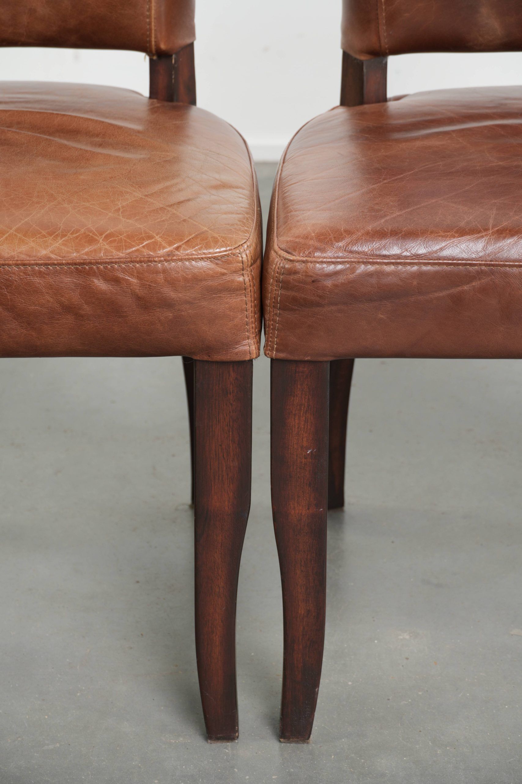 Set of 4 cognac-coloured cowleather dining chairs with decorative nails