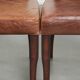 Set of 4 cognac-coloured cowleather dining chairs with decorative nails