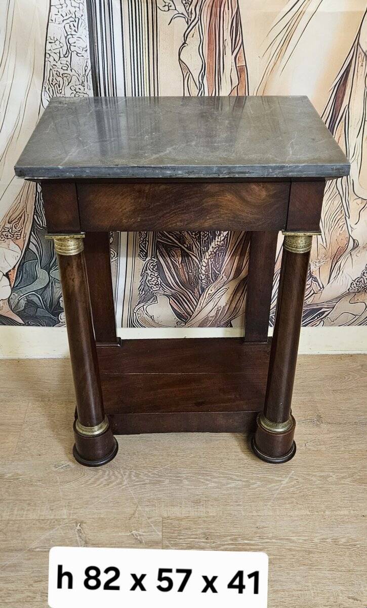 Console in mahogany and marble from the Empire period.
