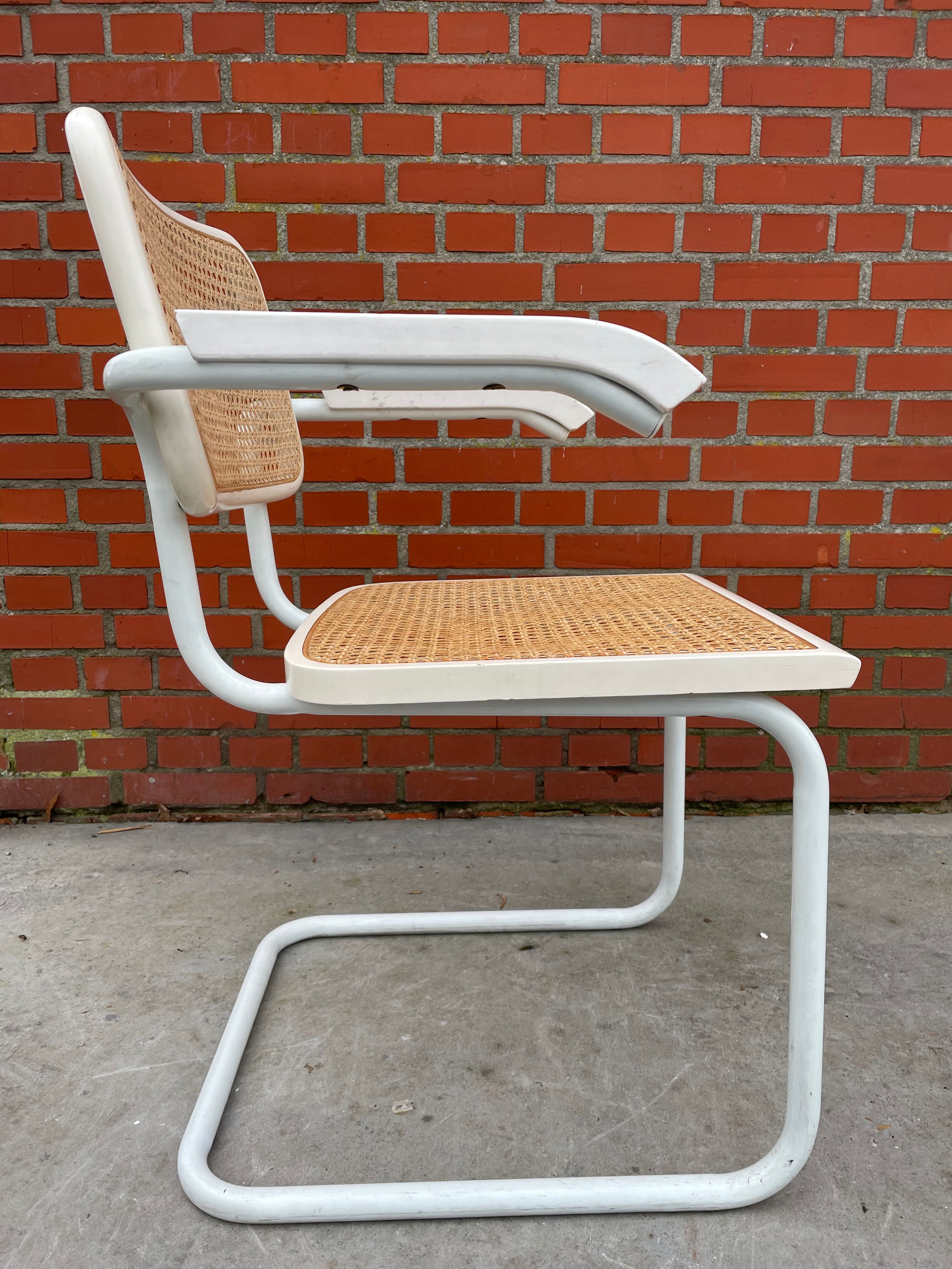 Cesca chair model with armrest in white