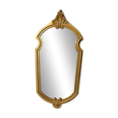 Antique Louis XV style mirror with a vintage carved gold frame.