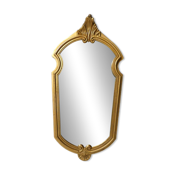 Antique Louis XV style mirror with a vintage carved gold frame.