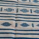 Traditional handmade white and blue kilim rug in natural wool