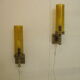 Pair of wall sconces, folded metal and yellow "shattered" glass