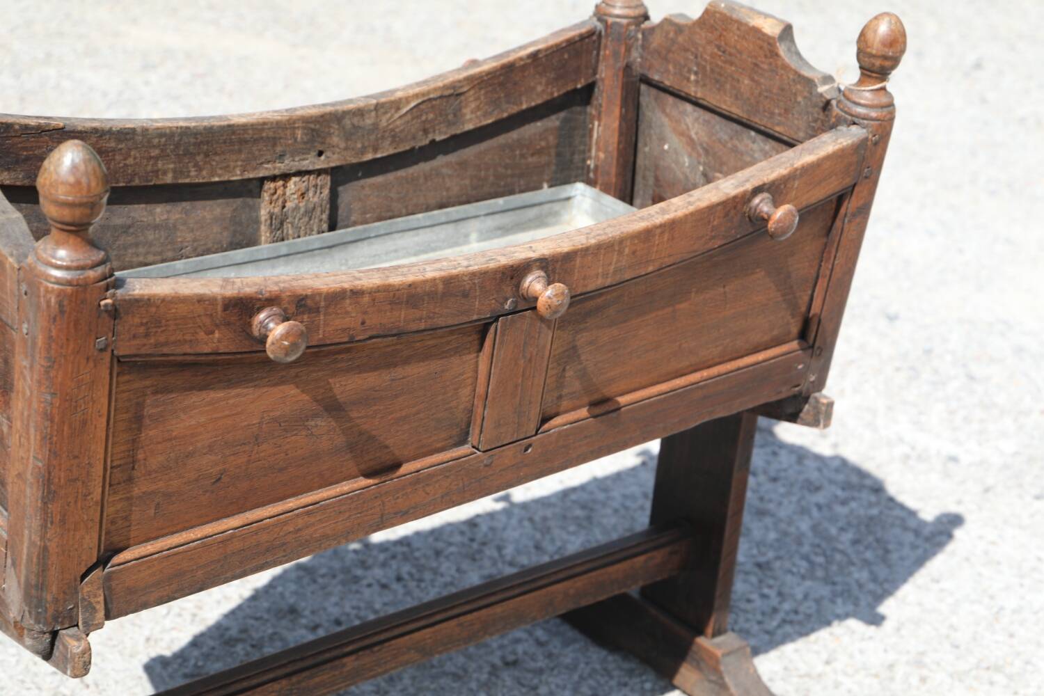 Antique cradle planter