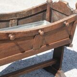 Antique cradle planter