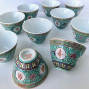 Chinese porcelain tea service with wicker basket