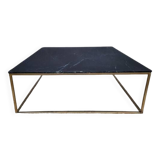 Coffee table or black marble and brass display "in its own juice"